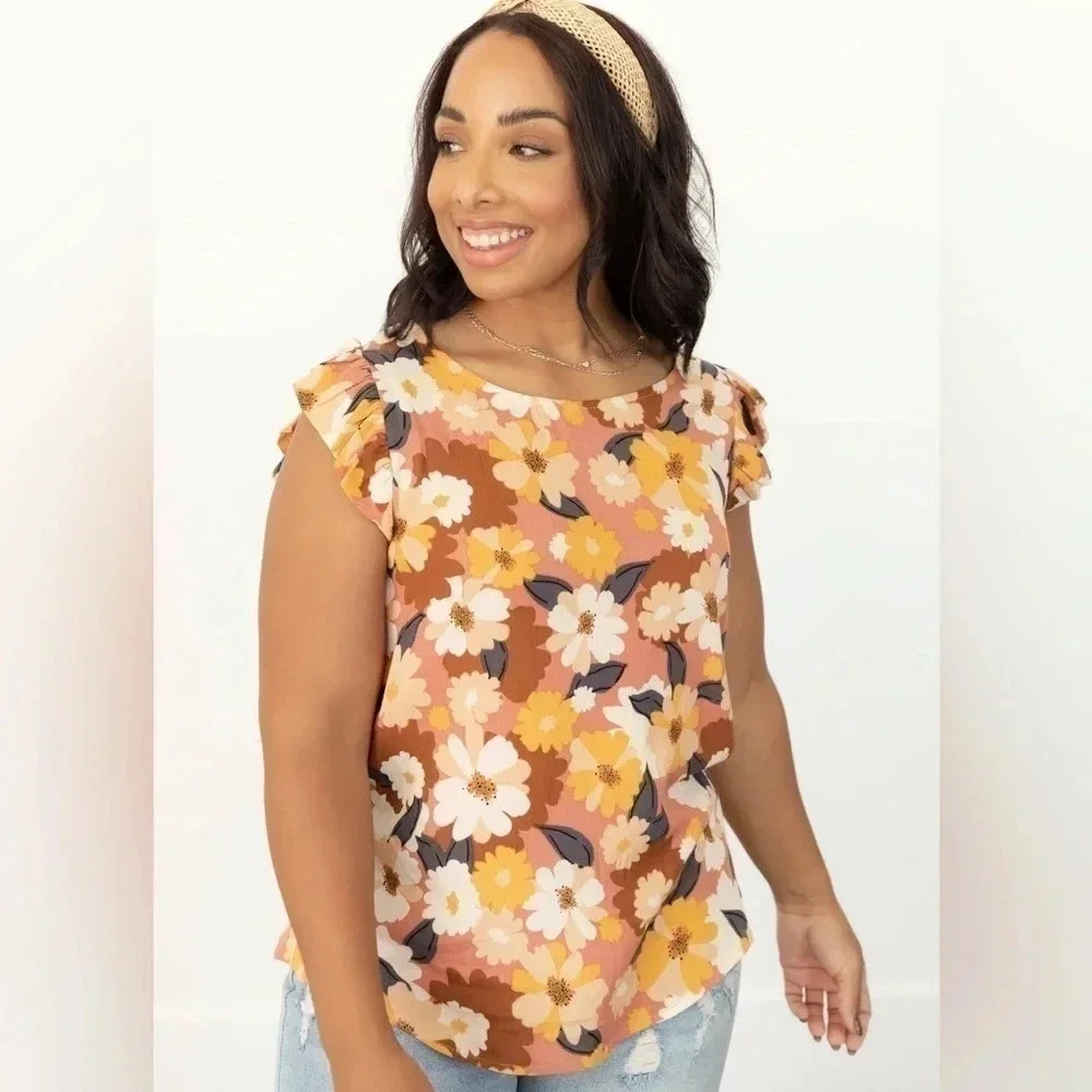 Boutique brand Les Amis floral ruffle sleeve top - Size medium new.